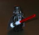 vader_with_light_up_saber.jpg