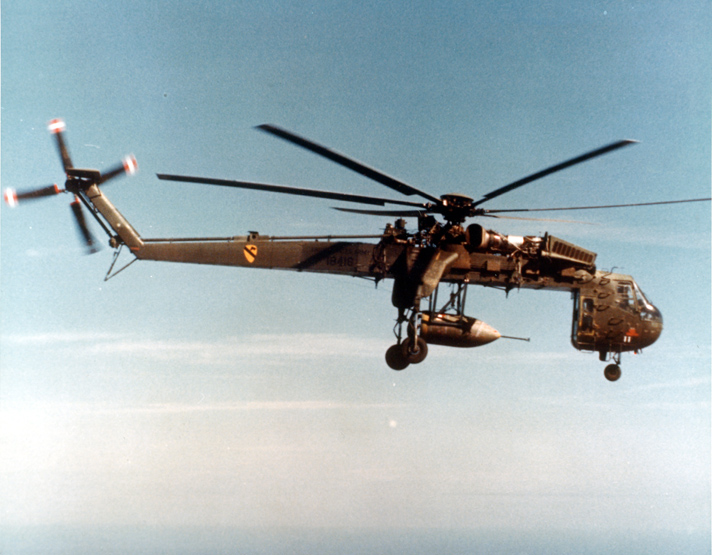 sikorsky_skycrane_carrying_parachute_bomb_c.jpg