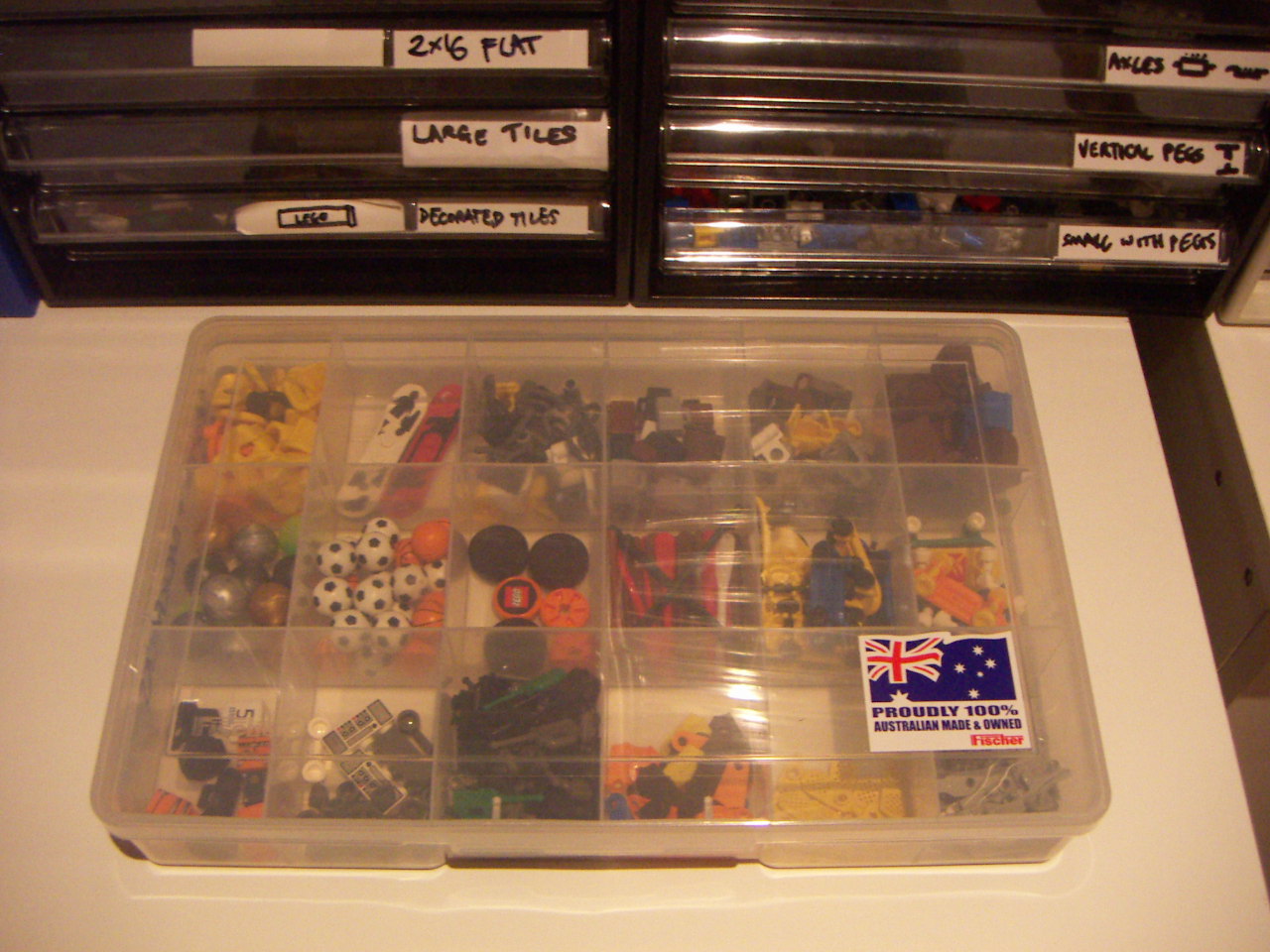 fischer_compartment_trays_with_sports_pieces.jpg