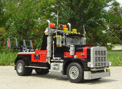 black_cat_tow_truck_passengers_side.jpg