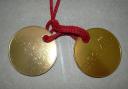 old-goldrush-medal-back.jpg