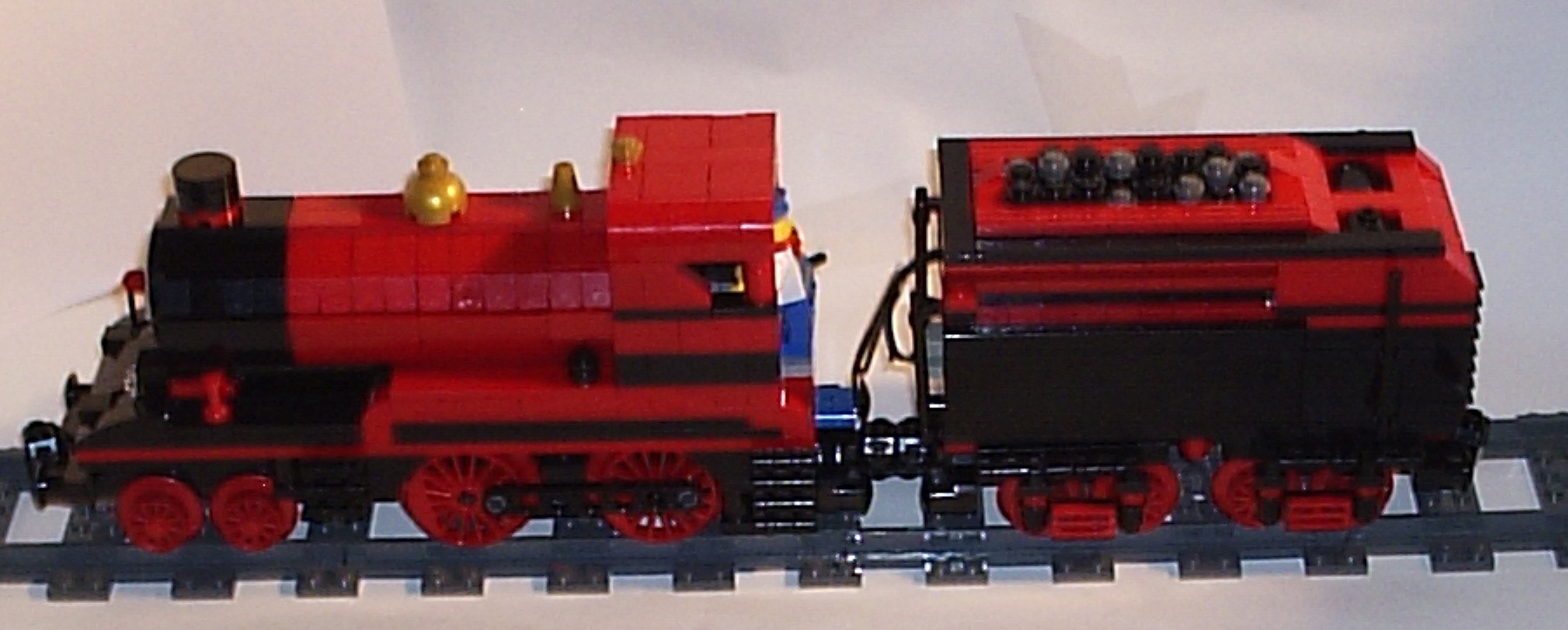 15_07_2012_red_and_black_4_4_0_tender_engine_f.jpg