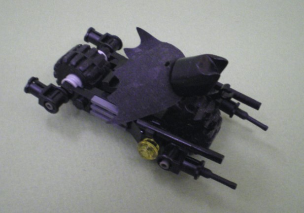 batpod_version_3_batman_riding_1.jpg
