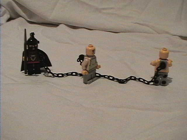 prisonersinchains.jpg