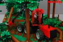 05_komatsu_931.1_cutting_a_tree.jpg