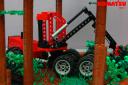 06_komatsu_931.1_cutting_a_tree.jpg
