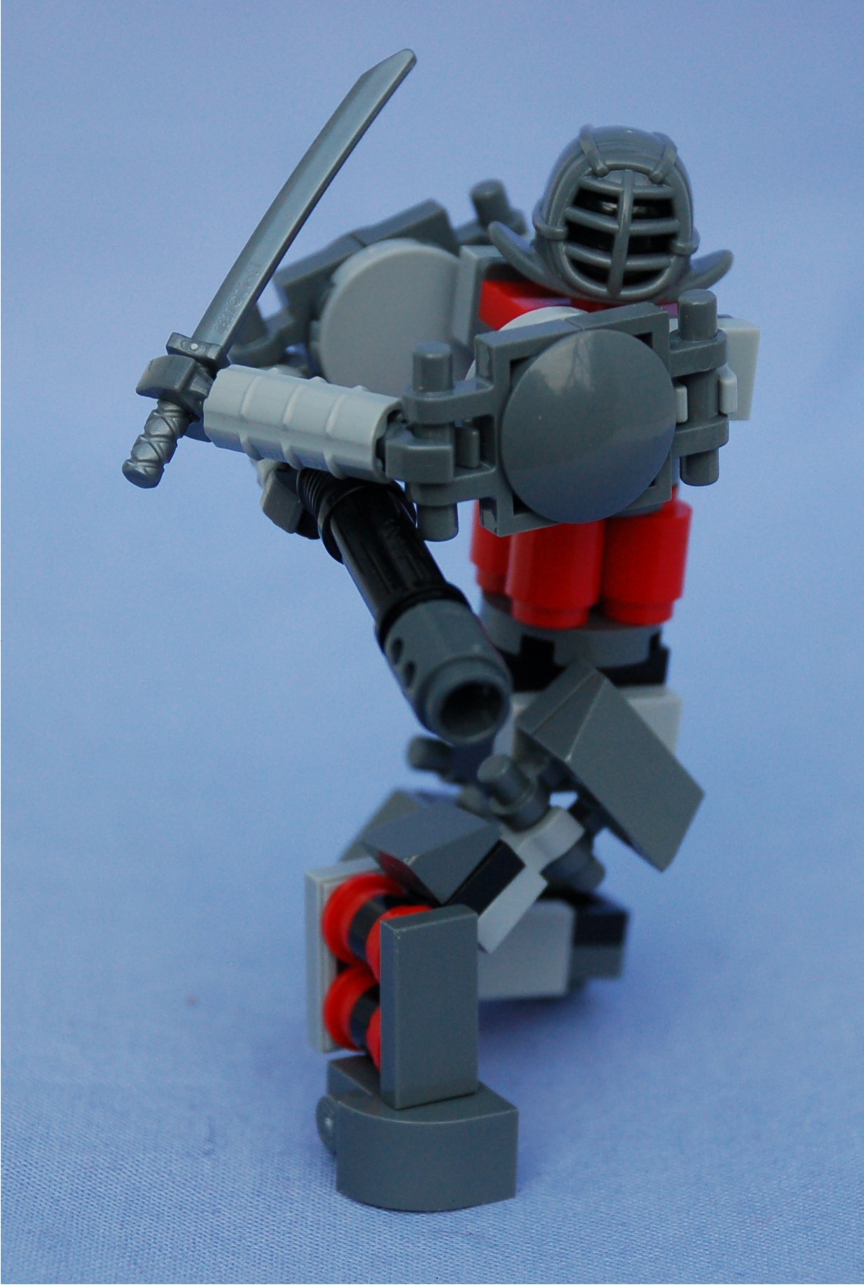 kendoka__sword_and_gun_kneeling.jpg