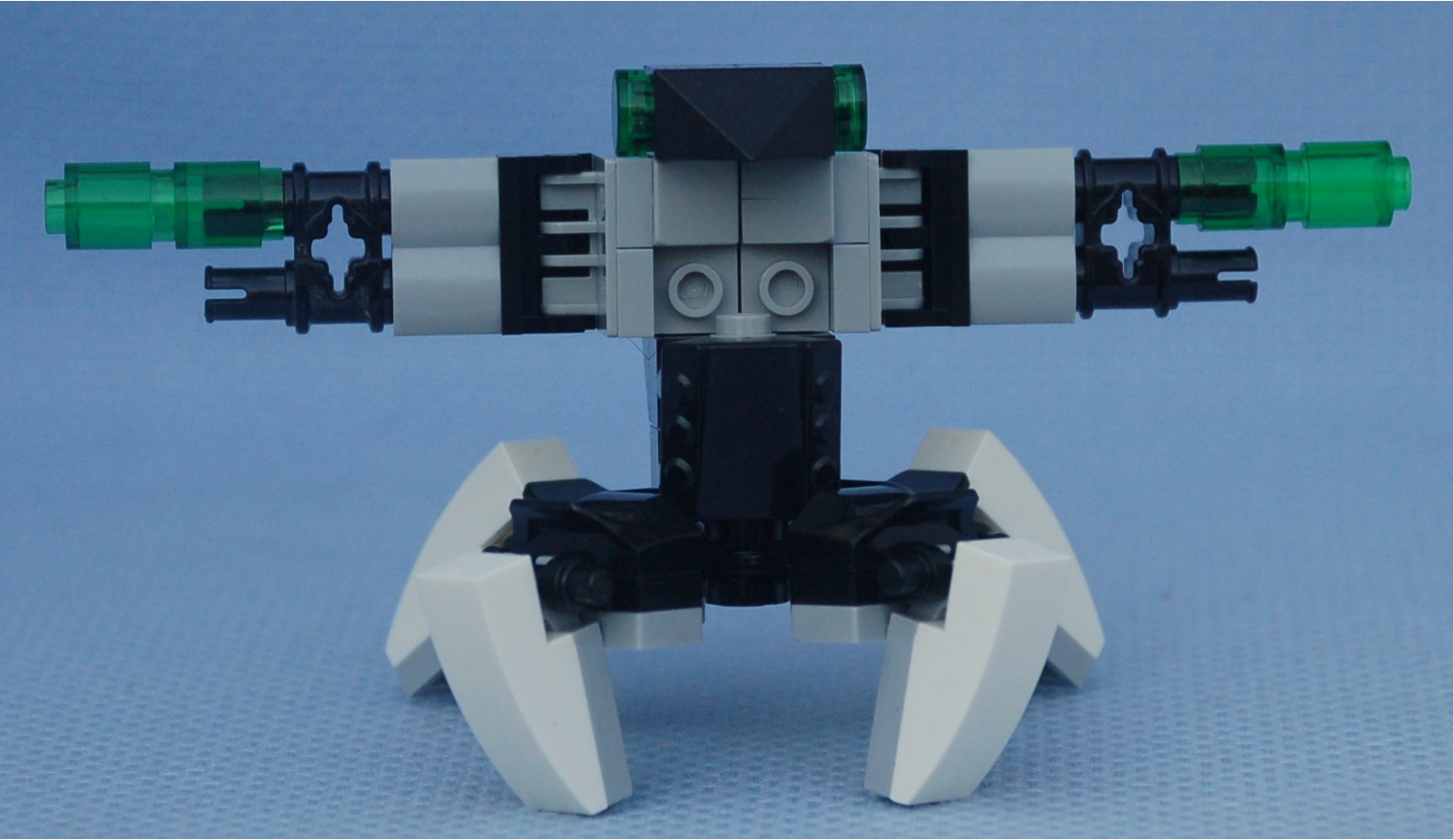 green_strider__arms_wide.jpg