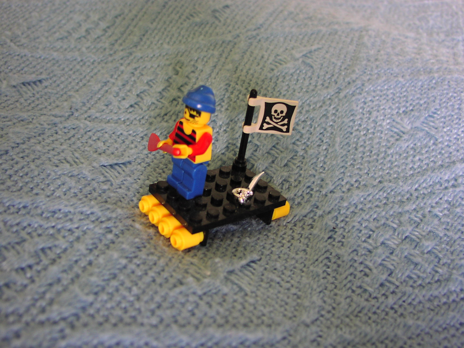 shipwrecked_pirate_on_a_raft.jpg