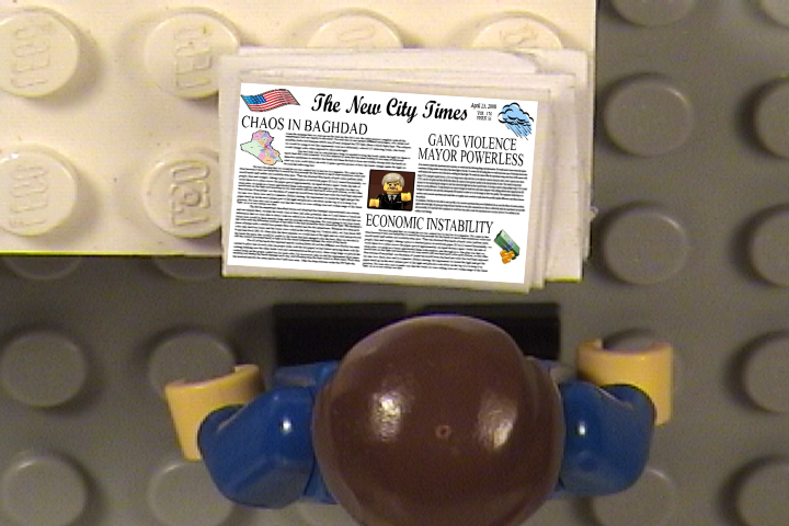 reading_newspaper_looking_down.jpg
