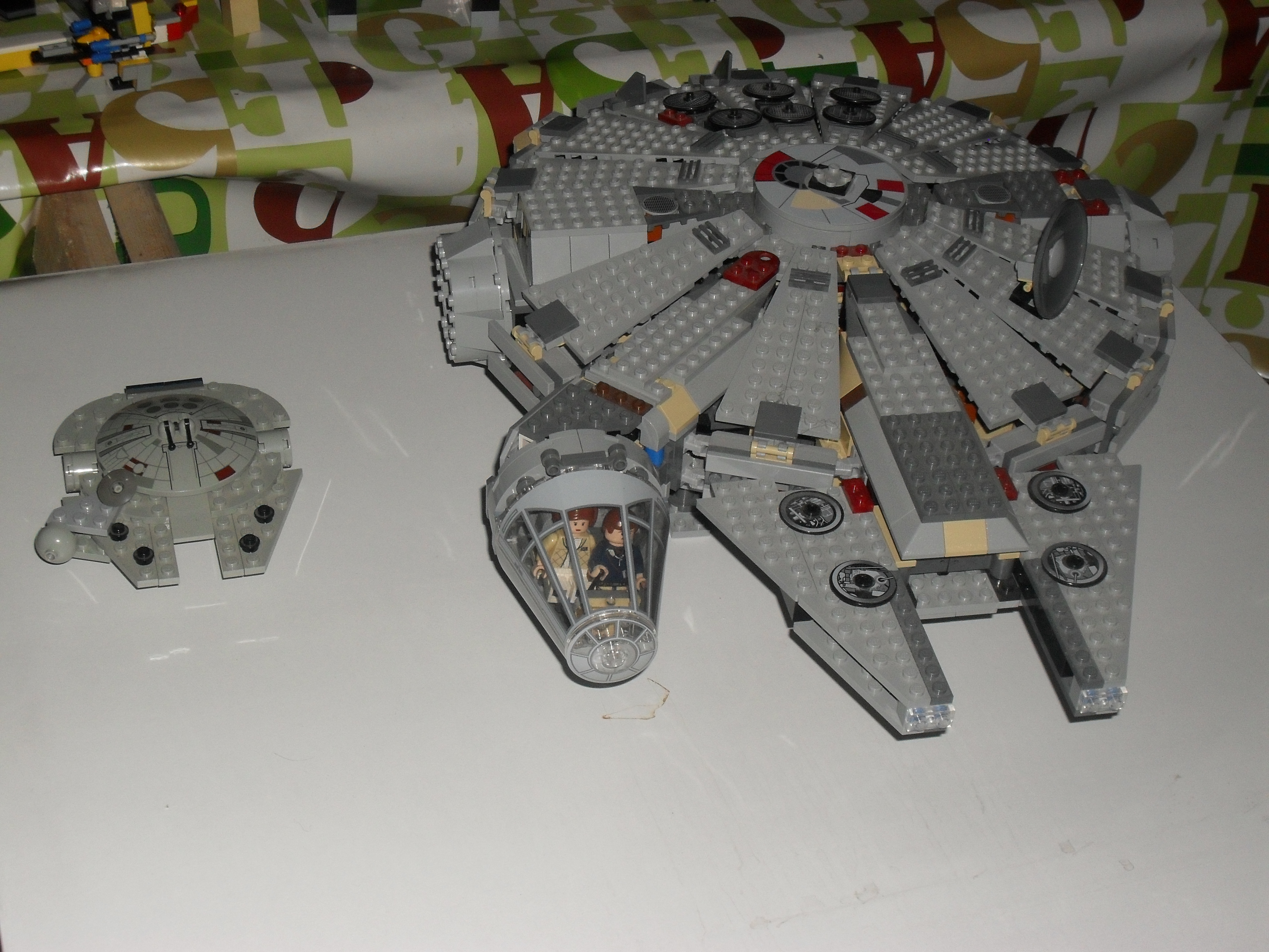 two_versions_of_millenium_falcon.jpg