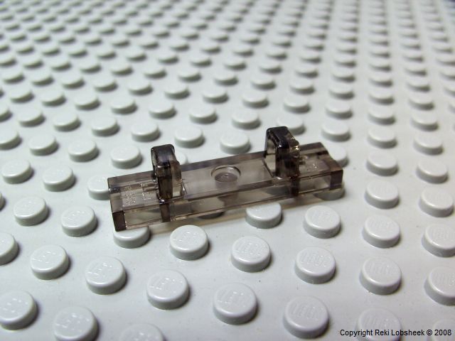 hinge_tile_1_x_4_trans_black.jpg