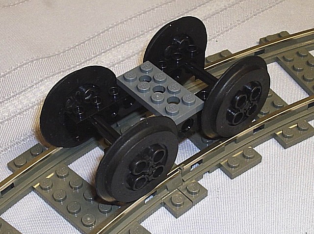 large_train_wheels_on_frame.jpg