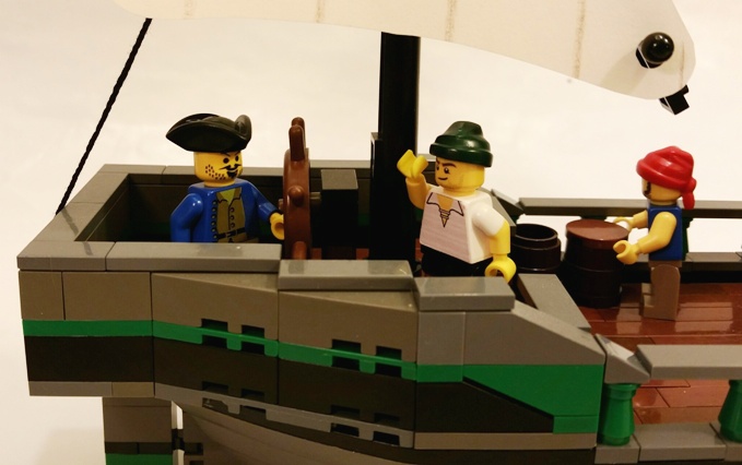 05-capt_at_helm.jpg