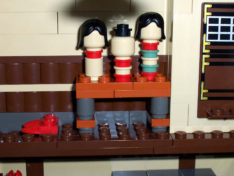 78_kokeshi_dolls_and_shoes_on_floor.jpg