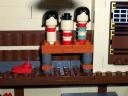 78_kokeshi_dolls_and_shoes_on_floor.jpg