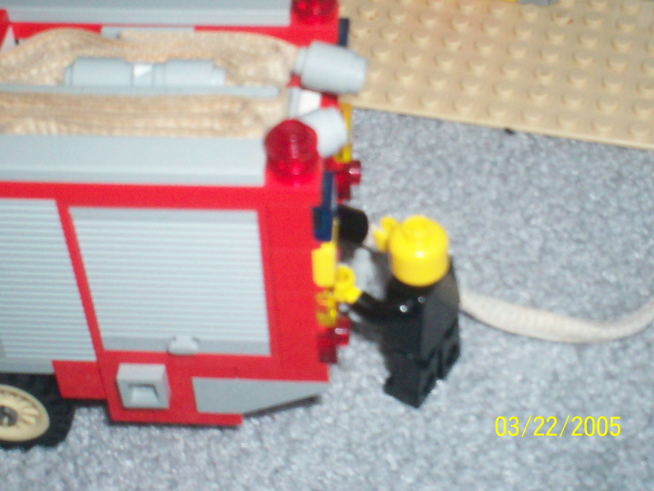 03_firefighter_hooking_to_truck.jpg