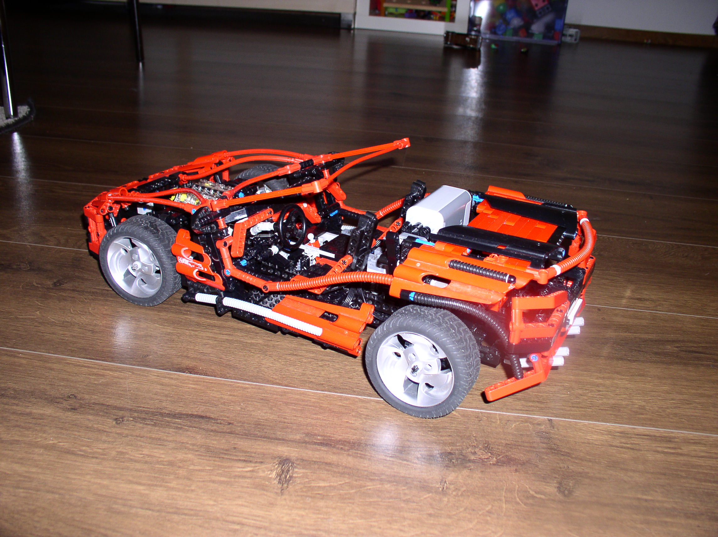 8448-red-car-with-eletrical-motors-12.jpg