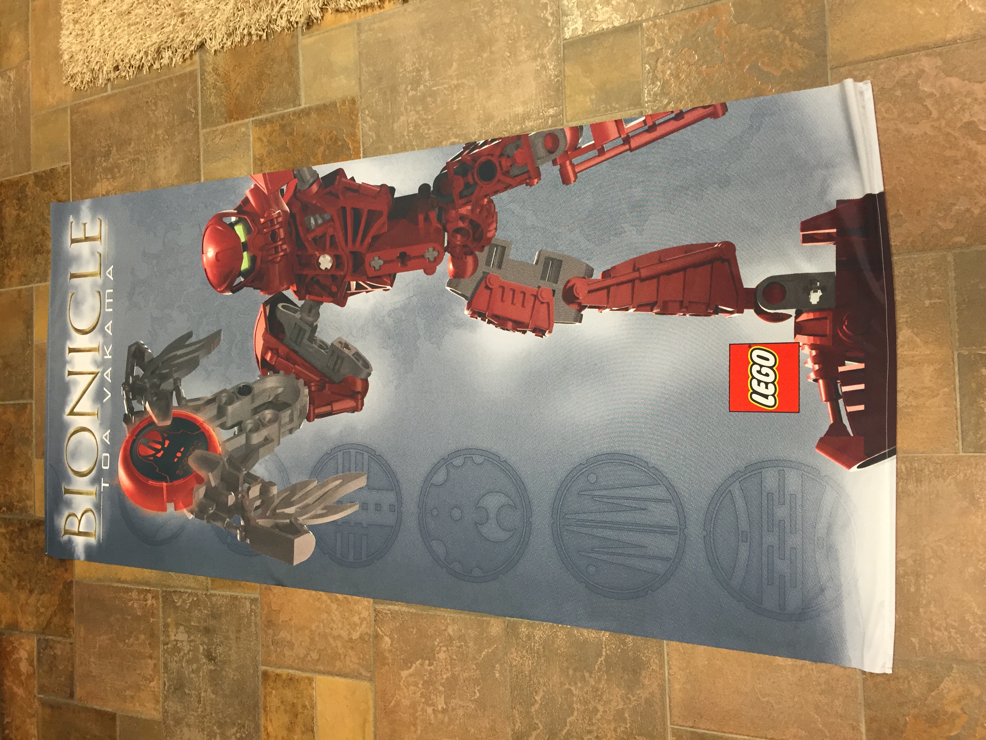 bionicle_retail_banner_of_2004_toa_vakama_metru.jpg