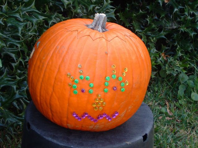 lightsaberbladesinpumpkin.jpg
