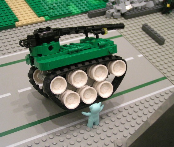 teddy_bear_lifting_tiny_tank.jpg