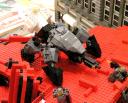 white__black_and_blay_mecha_on_red_ruin.jpg