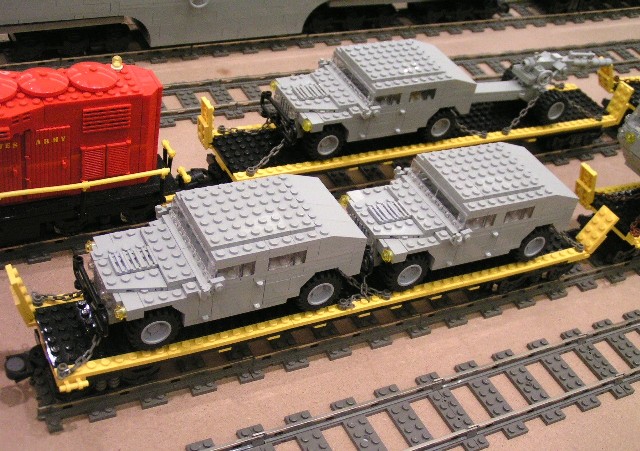 army_hummers_on_car.jpg
