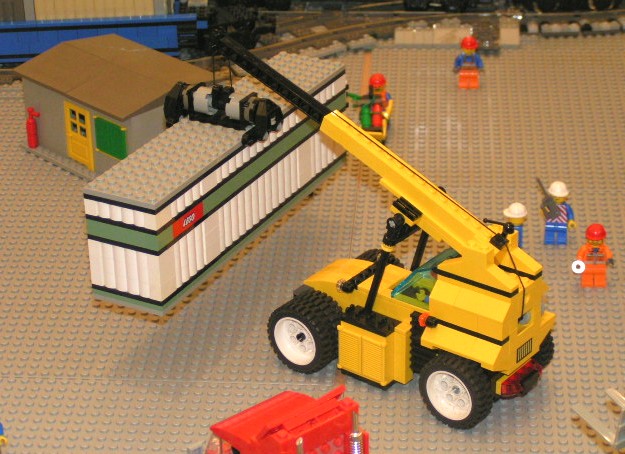 crane_lifting_white_trailer.jpg