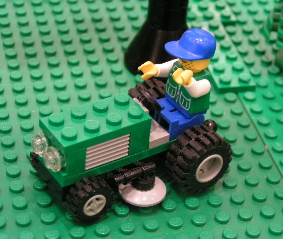 guy_on_lawnmower.jpg