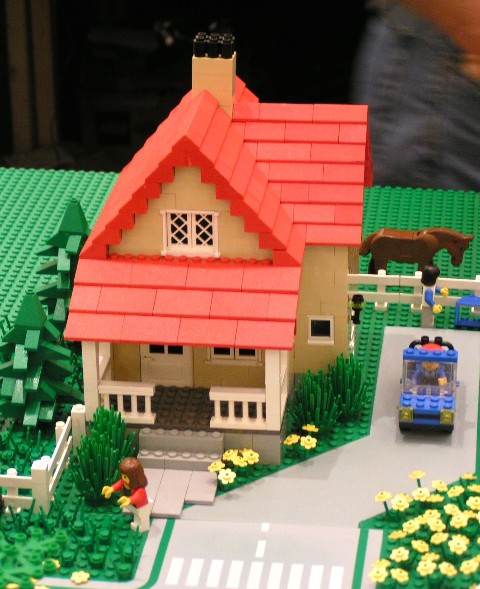 tan_house_red_roof.jpg