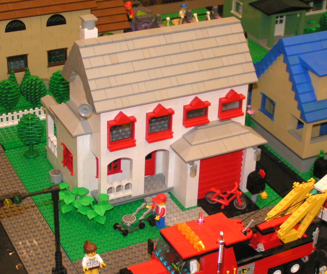 white_house_with_gray_roof.jpg