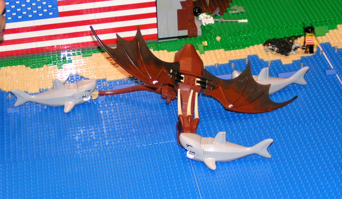 dragon_getting_eaten_by_sharks.jpg