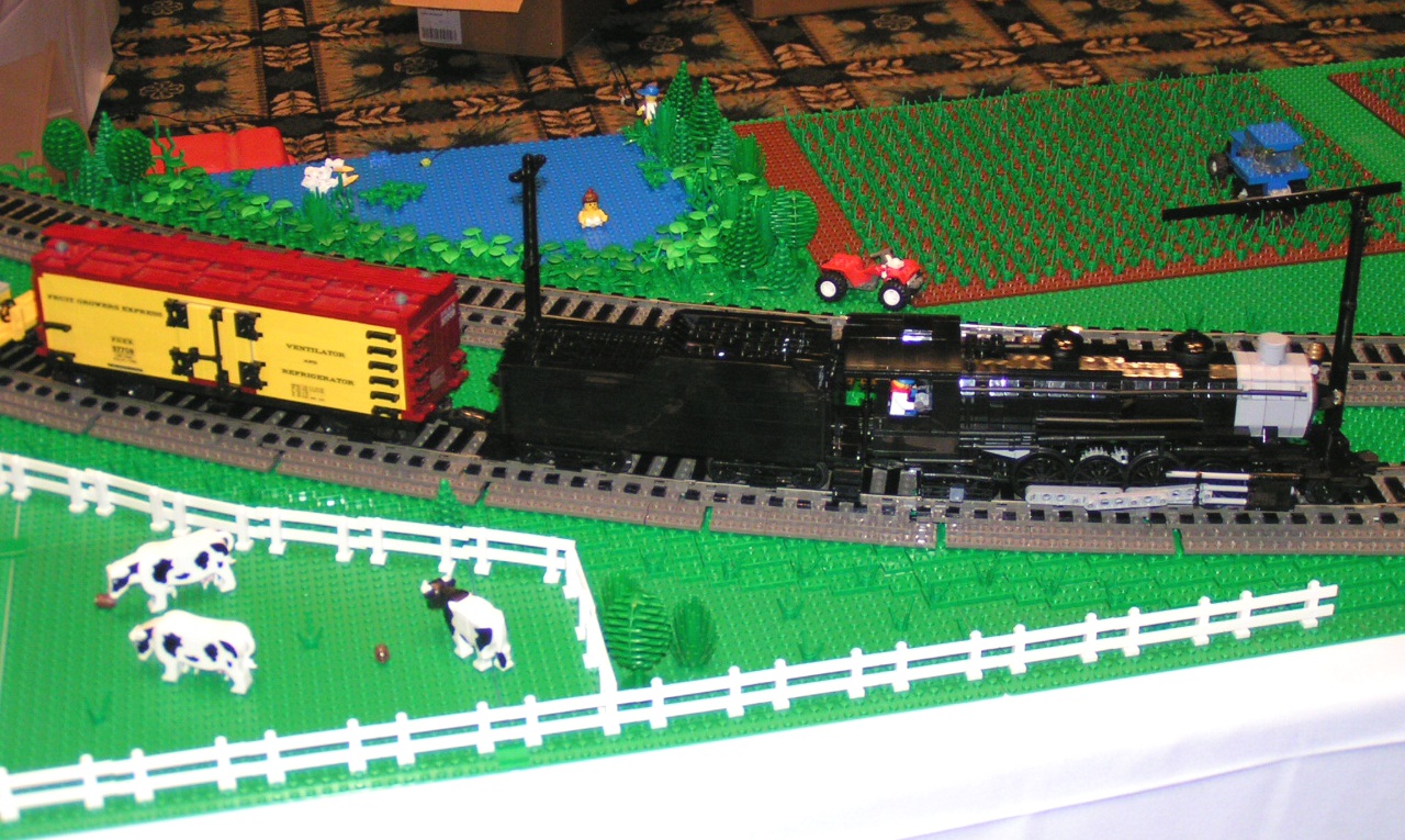 train_going_by_tracks.jpg