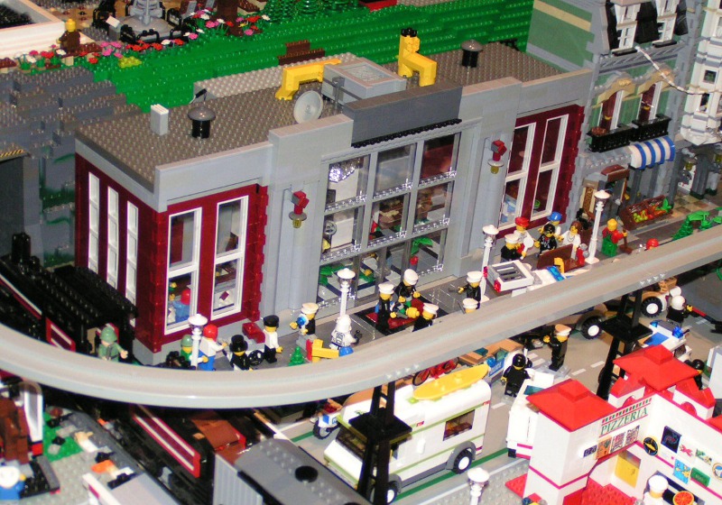 gray_building_with_guy_getting_arrested.jpg
