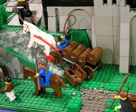 gold_spilling_off_of_cart.jpg