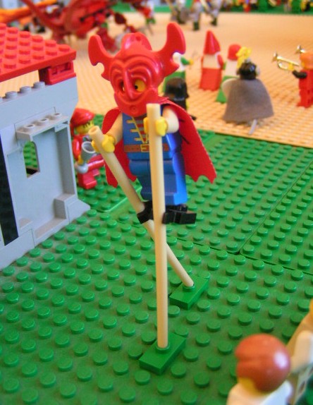 carnival_guy_walking_on_stilts.jpg