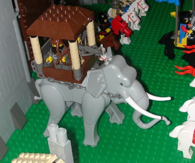 elephantwith3guys.jpg