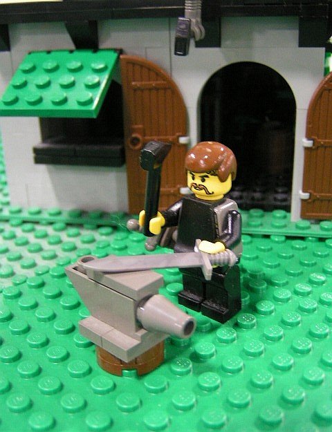blacksmith_hammering_on_sword.jpg