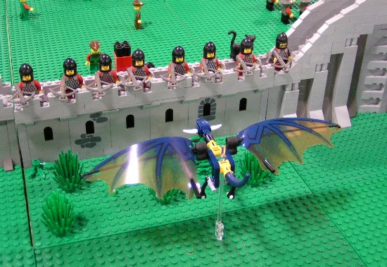wyvern_approaching_archers_on_wall.jpg