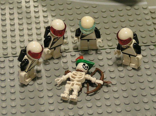 space_guys_looking_at_dead_castle_guy.jpg