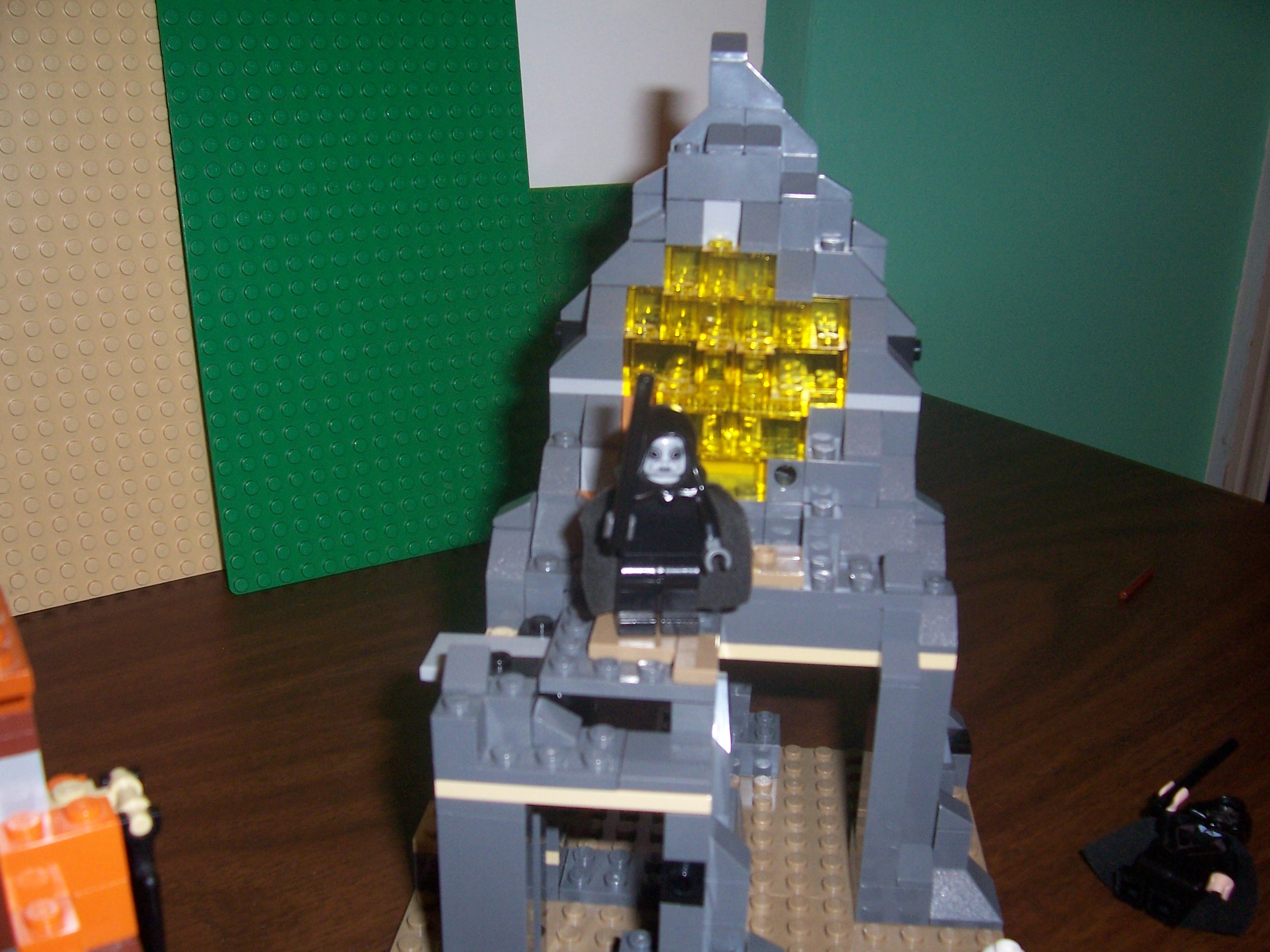 death_eater_standing_on_high_rock_platform.jpg