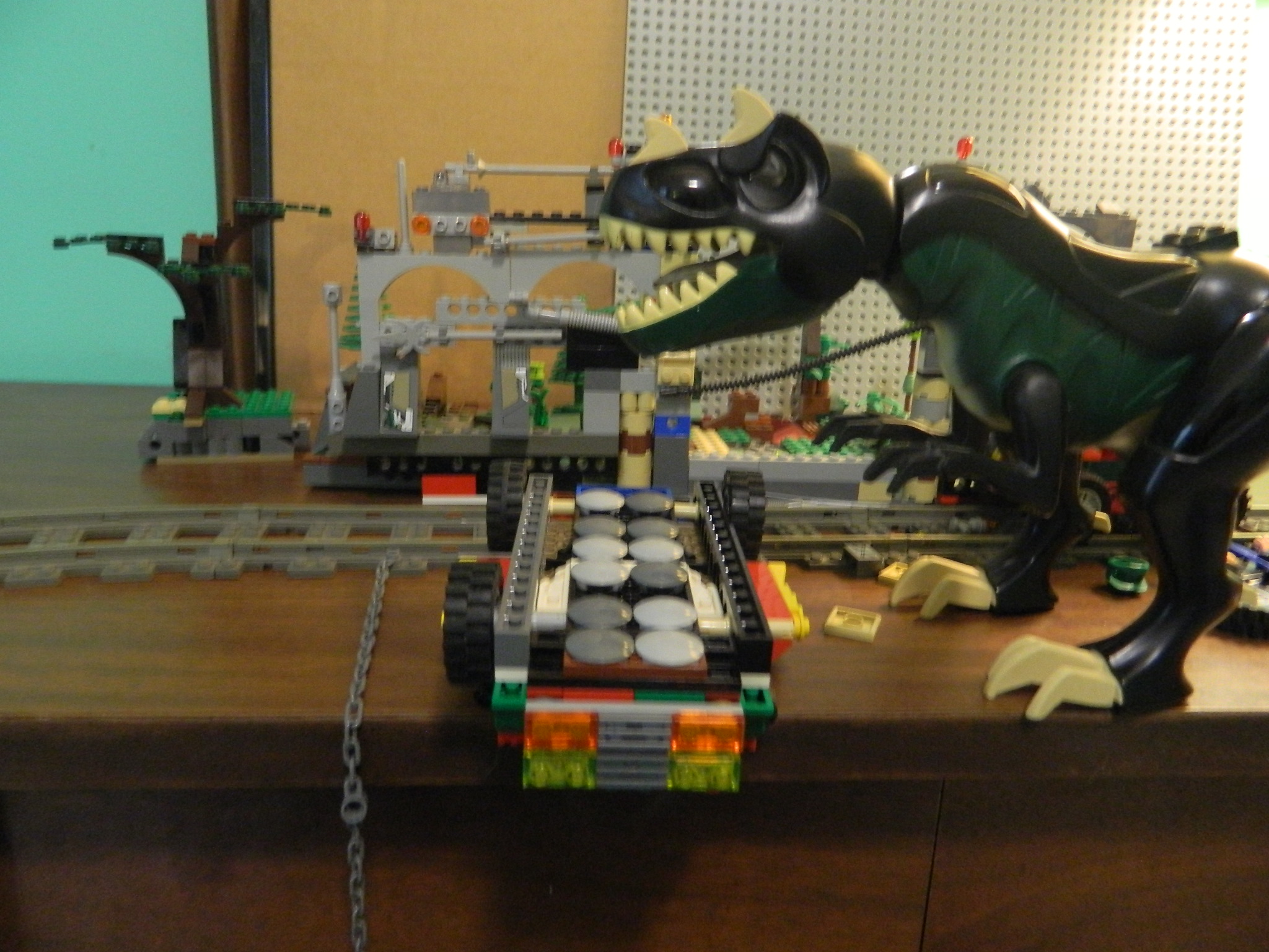 trex_pushes_land_cruiser_of_ledge_2.jpg