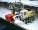 fork_lift_lifting_a_car.jpg
