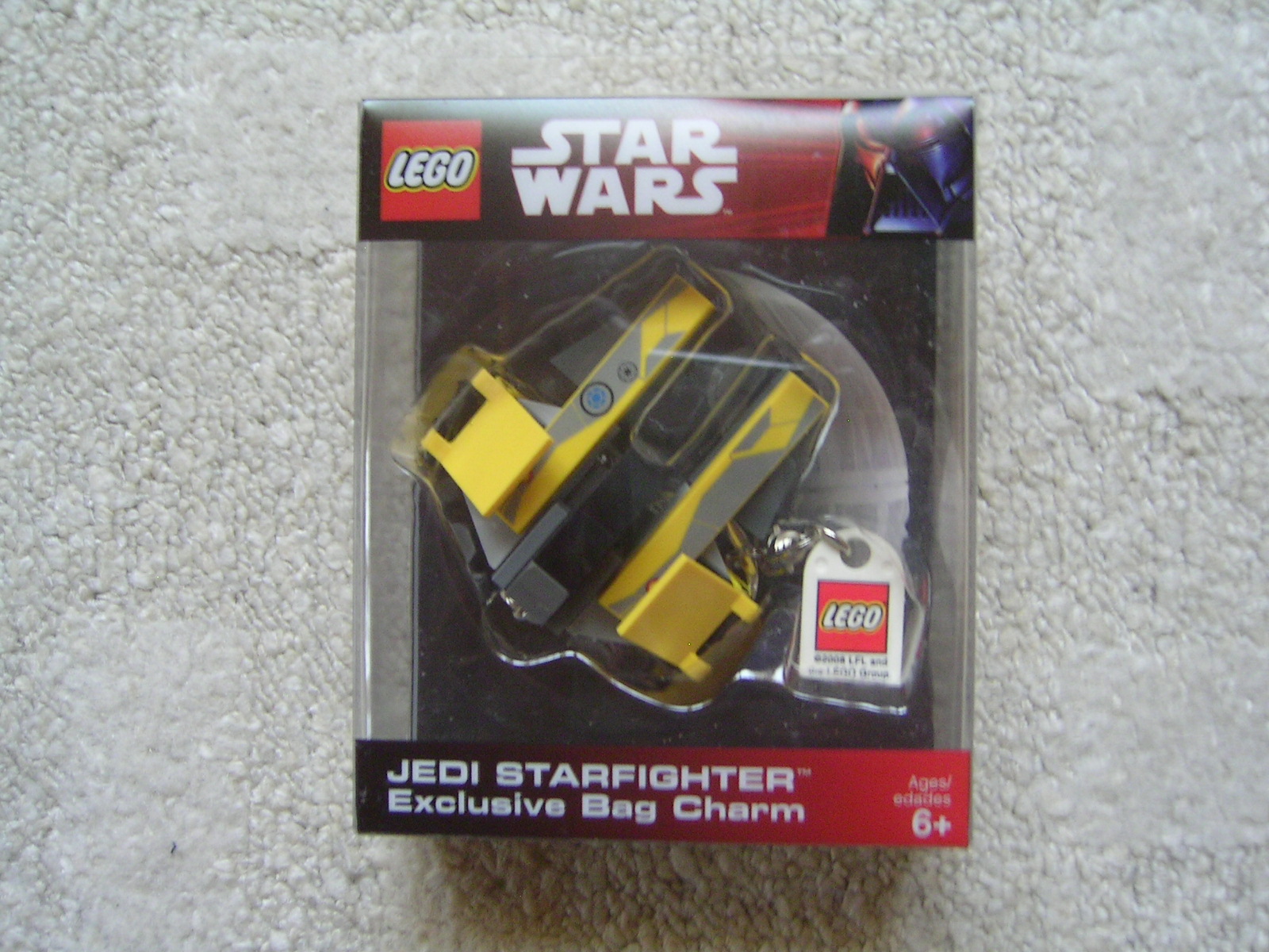 852247_jedi_starfighter_bag_charm.jpg