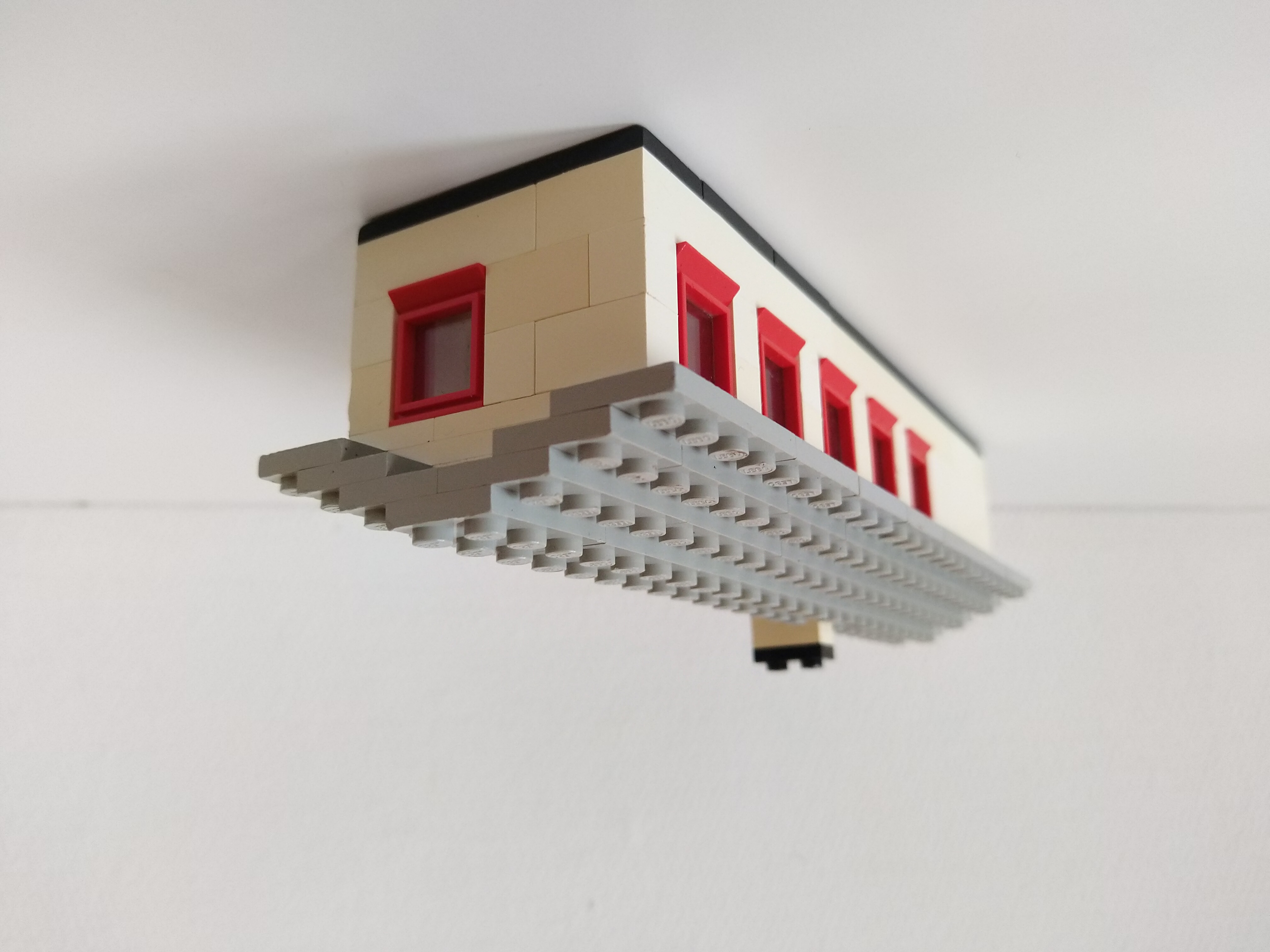 small_grey_bungalow_with_garage_-_side.jpg