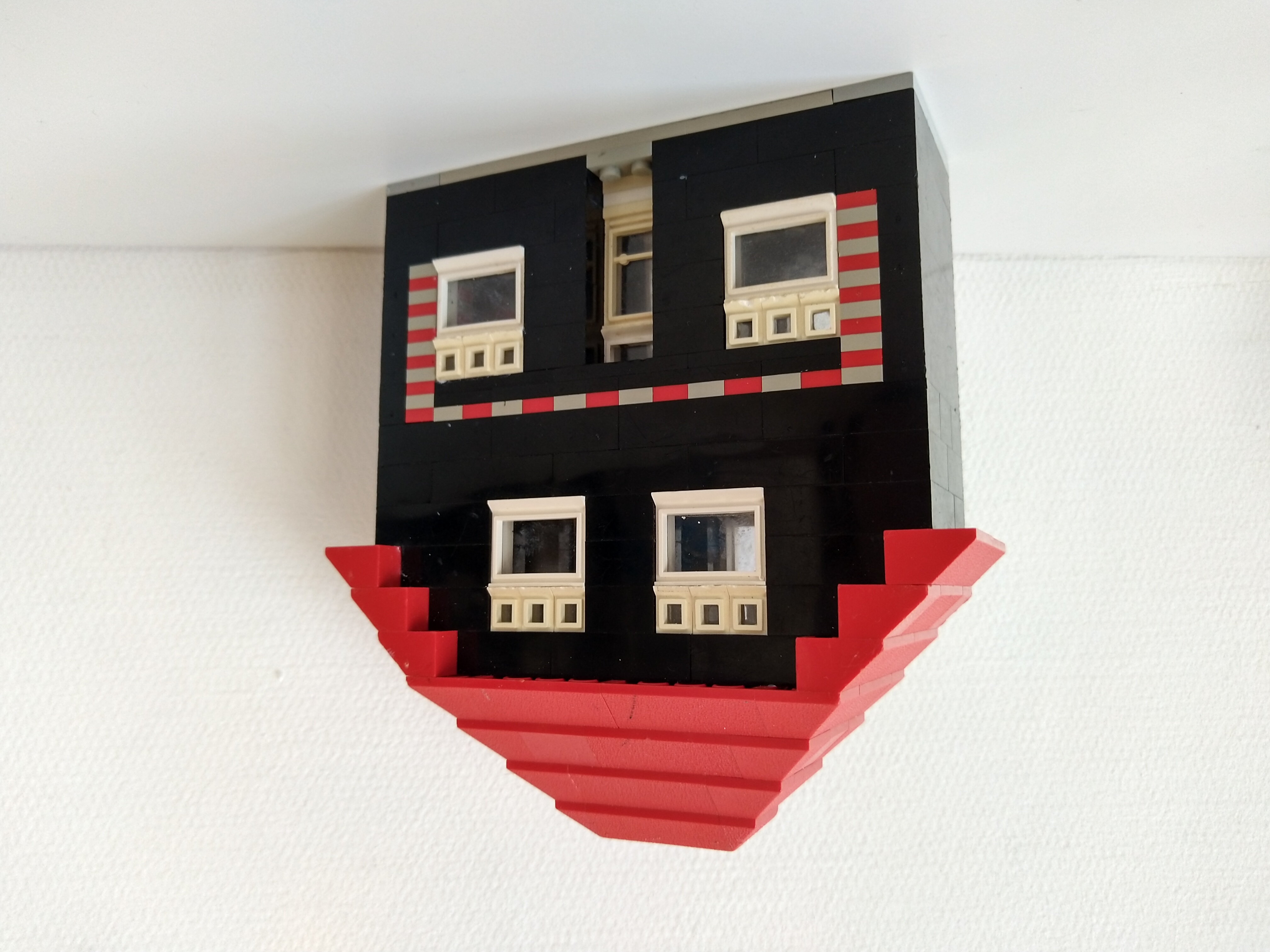 small_black_house_front_and_back.jpg