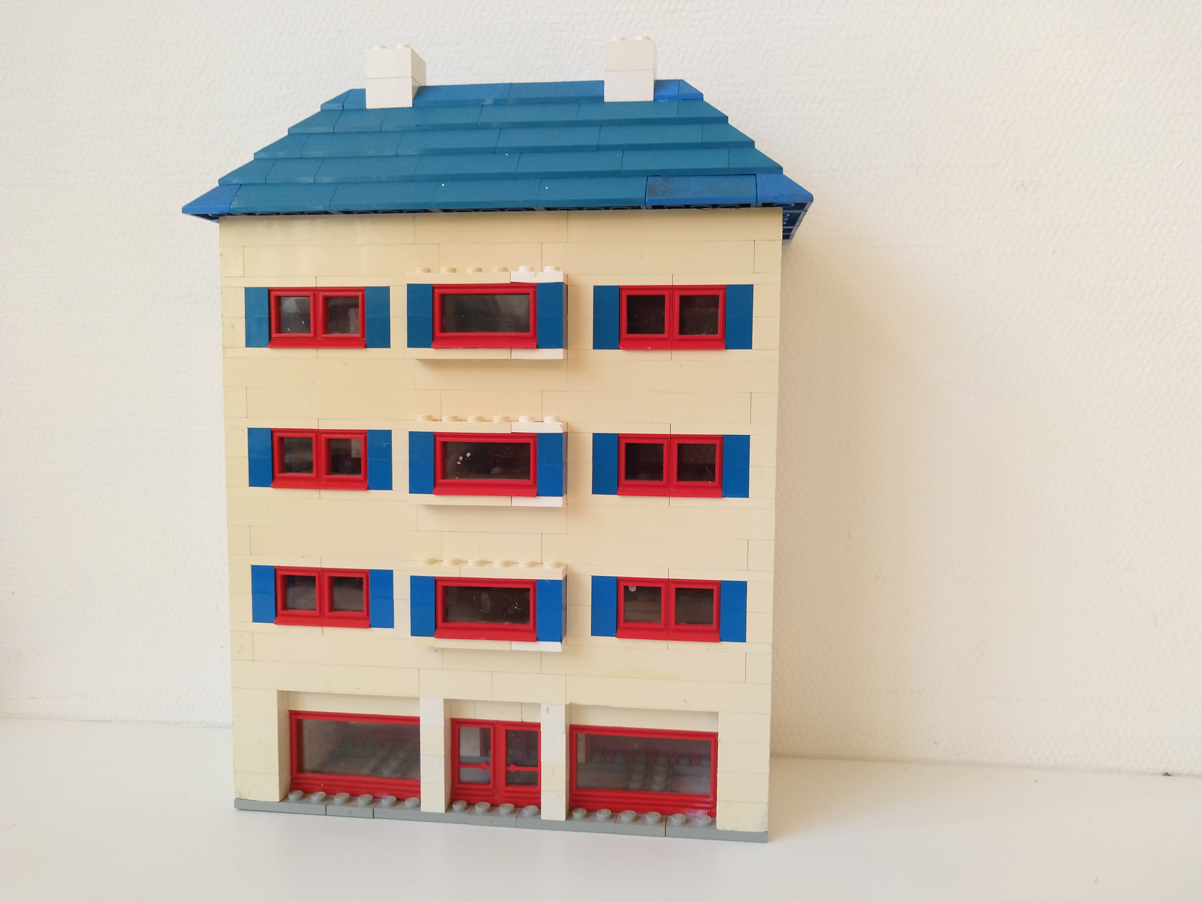 small_flat_with_shops_-_front.jpg