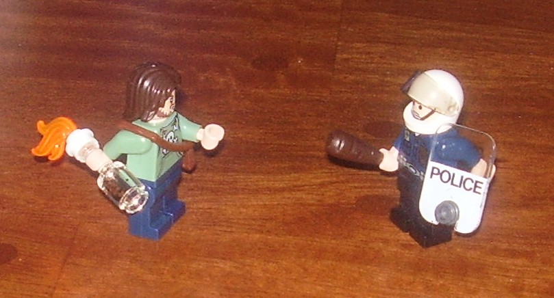 rioter_and_cop.jpg