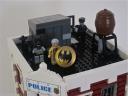 16_gcpd_rooftop_with_batman.jpg
