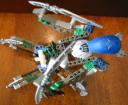 blue-mask-nidhiki-body-down-claws-up-aerial-view.jpg